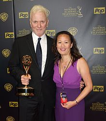 Anthony Geary holding his 8th Daytime Emmy next to General Hospital Online creator May Lee, April 26, 2015