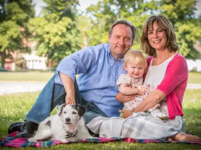 Photo of Fiona Dolman with her husband, son and their dog