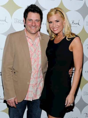 A photo of Allison Alderson and her husband Jay DeMarcus
