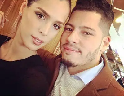 Adrian Torres together with his Wife Carmer Carrera Image