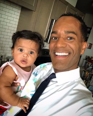 Photo of Dunigan and his baby