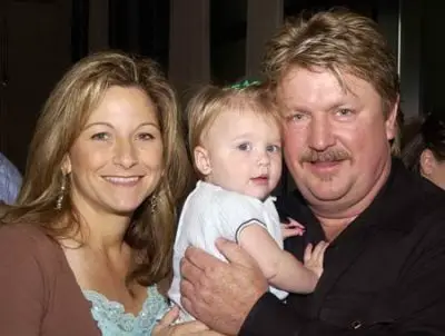 An old photo of Janise Parker, the late Joe Diffie and their child.