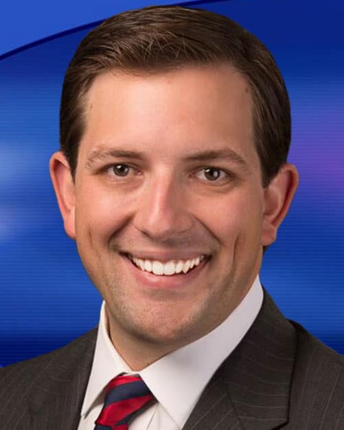 KHQ news reporter Peter Maxwell