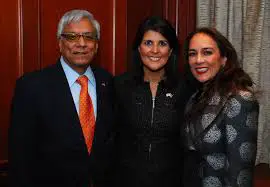 Sarvjit Randhawa with his wife, Harmeet Dhillon, and Governor Haley.
