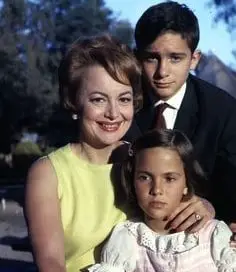 A family photo of young Olivia de Havilland with Son Benjamin Goodrich and daughter Gisele