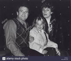 Mariah Dobson at a young age and parents photo