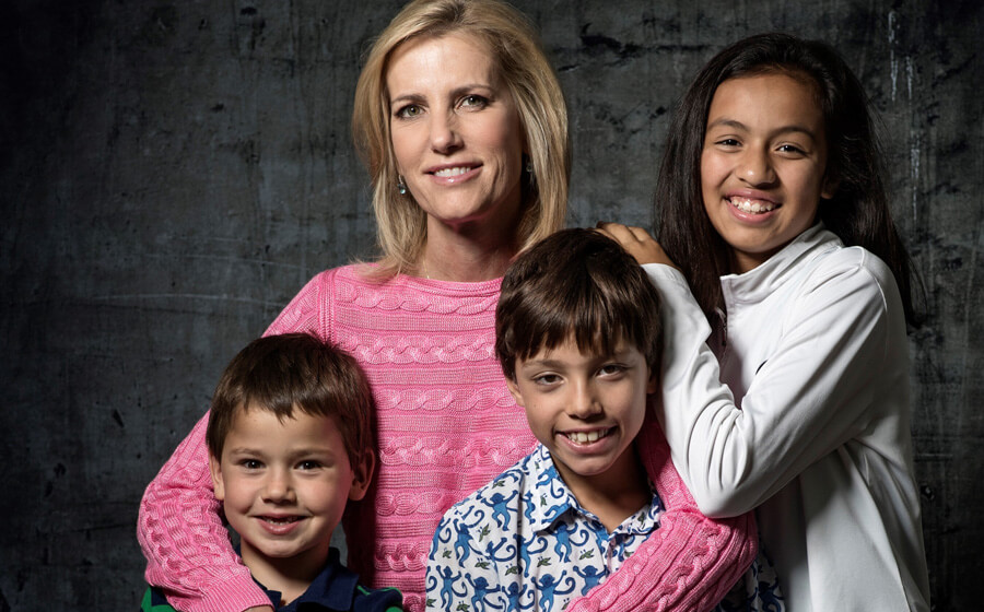 A family photo of Nikolai Peter, his mom Ingraham and siblings