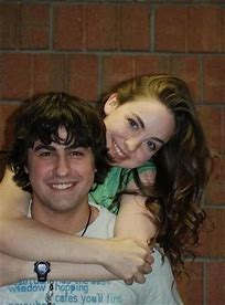 A photo of Ryne Sanborn with a girlfriend